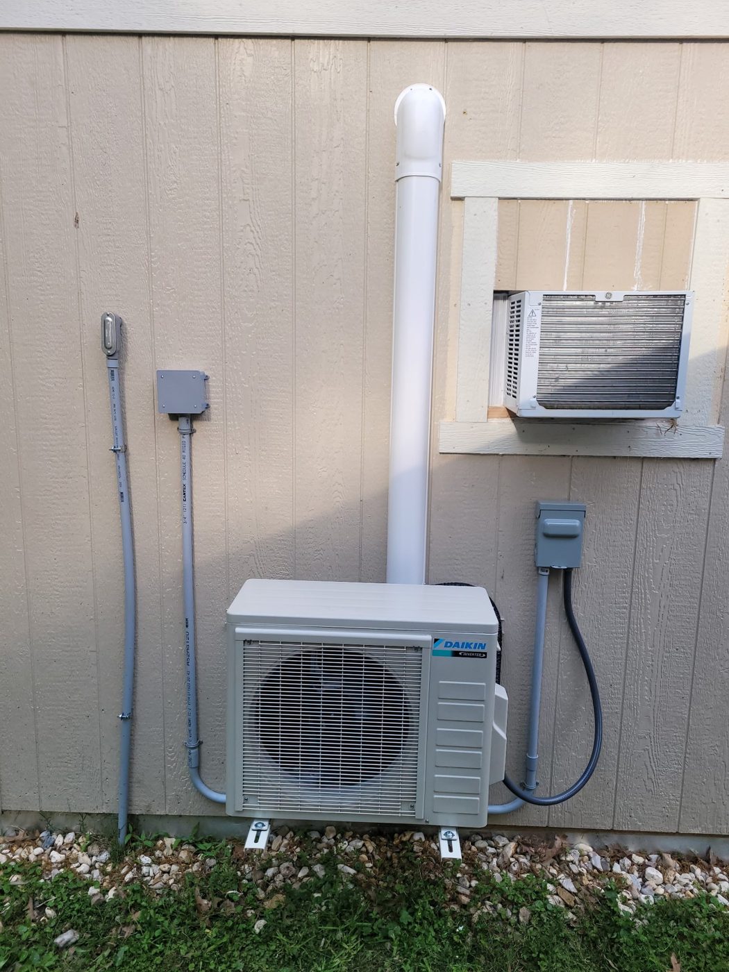 Daikin mini-split outdoor unit with line cover