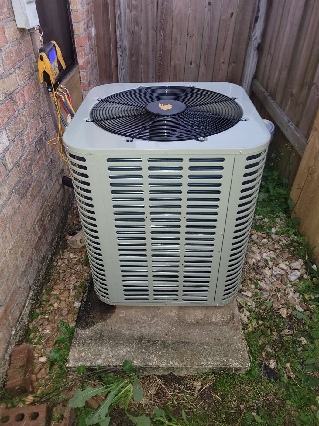 New condenser being charged and tested with gauges
